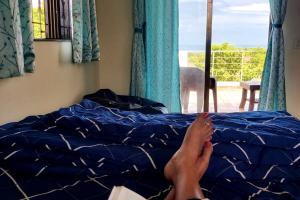 Voodi või voodid majutusasutuse Sea-view 2 BHK bungalow, Kolthare beach, Dapoli toas