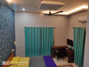 Μια τηλεόραση ή/και κέντρο ψυχαγωγίας στο Mystique Copper Villa- Karwar near Goa +8 φωτογραφίες