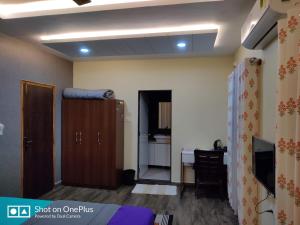 Μια τηλεόραση ή/και κέντρο ψυχαγωγίας στο Mystique Copper Villa- Karwar near Goa