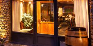 Um restaurante ou outro lugar para comer em Hotel Michelangelo