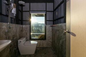 Koupelna v ubytování Flower hill 180