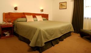 Cama ou camas em um quarto em Hotel Michelangelo