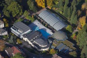 an overhead view of a large building with a solarium at Ausblick apartments in Badenweiler