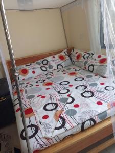 Ένα ή περισσότερα κρεβάτια σε δωμάτιο στο Alicia