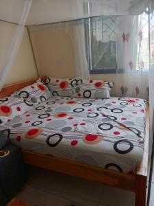 Ένα ή περισσότερα κρεβάτια σε δωμάτιο στο Alicia