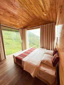 Ένα ή περισσότερα κρεβάτια σε δωμάτιο στο Háng Đồng Ecolodge