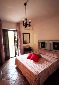 Postel nebo postele na pokoji v ubytování Antica Quercia