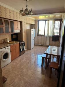 Kuchyň nebo kuchyňský kout v ubytování Vayk Apartment