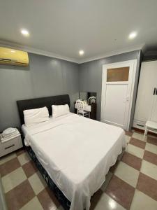 Postel nebo postele na pokoji v ubytování Ezel Group Hotel