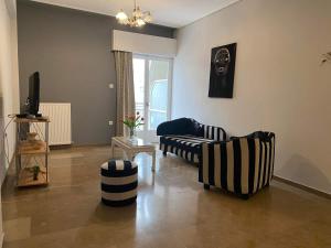 Μια τηλεόραση ή/και κέντρο ψυχαγωγίας στο MARIAS APARTMENT TRIKALa