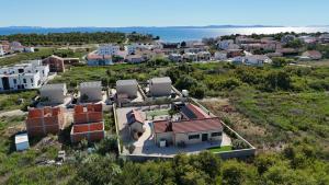 an aerial view of a house on a hill at Luxury Villa Mala in Privlaka