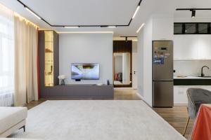 En eller flere senge i et værelse på Inju Premium apartments