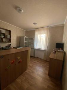 Η κουζίνα ή μικρή κουζίνα στο Хостел у Антоніни