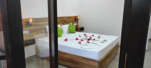 Ένα ή περισσότερα κρεβάτια σε δωμάτιο στο Stone Garden