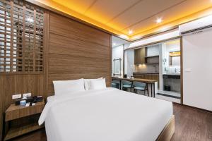 Ένα ή περισσότερα κρεβάτια σε δωμάτιο στο A25 Hotel - 21 Nghia Tan