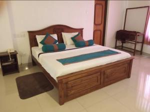 Postel nebo postele na pokoji v ubytování Hotel Lion Inn