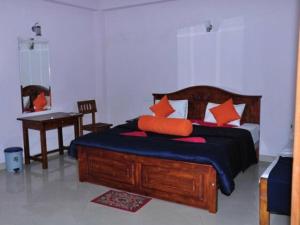 Postel nebo postele na pokoji v ubytování Hotel Lion Inn + 1 fotografie