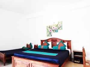 Postel nebo postele na pokoji v ubytování Hotel Lion Inn