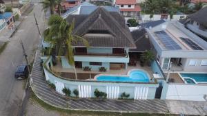 Πισίνα στο ή κοντά στο Pousada Luna - Peruíbe