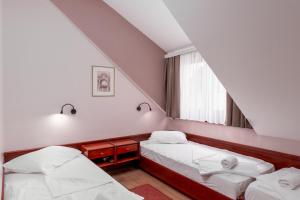 Postel nebo postele na pokoji v ubytování B&B Garestin