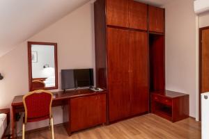 TV a/nebo společenská místnost v ubytování B&B Garestin