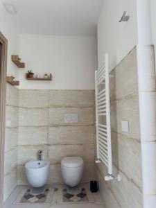 Koupelna v ubytování Olmata B&b + 14 fotografií