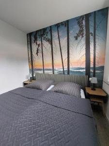 Un pat sau paturi într-o cameră la Saale-Panorama +7 fotografii