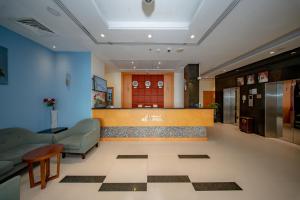 a lobby of a hospital with a waiting room at City Stay Grand Hotel Apartments - Al Barsha in Dubai