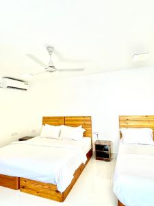 Ένα ή περισσότερα κρεβάτια σε δωμάτιο στο Jazeeraa beach stay +13 φωτογραφίες