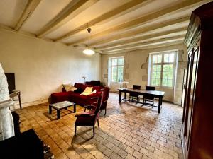 Χώρος καθιστικού στο Le Presbytère de la Couture