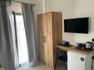 Kuchyň nebo kuchyňský kout v ubytování SENSIMAR Rooms To Let