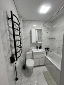 Ένα μπάνιο στο Апартаменти +1 φωτογραφίες