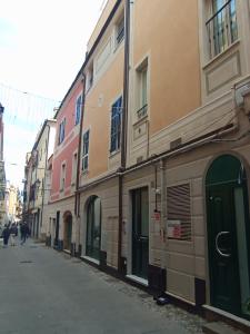 a row of buildings on the side of a street at Miramare4 in Ceriale