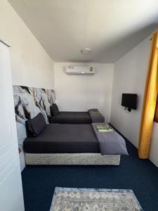 Afbeelding uit fotogalerij van Private Room in Sur House in Sur