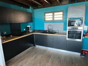 Η κουζίνα ή μικρή κουζίνα στο L'écrin de l'océan - Magnifique vue mer