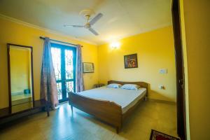 Postel nebo postele na pokoji v ubytování Rishani-alay An Exclusive Affair by the Fountain