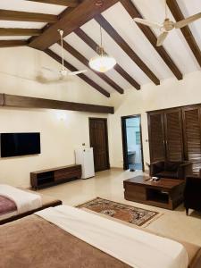 Et tv og/eller underholdning på Iconic Lodge + 48 billeder