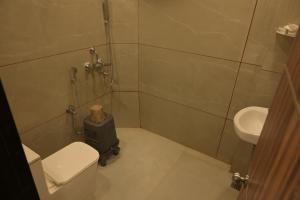 Ένα μπάνιο στο Hotel SLR Grand Haven