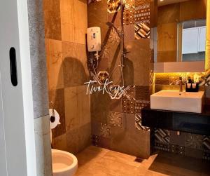 Koupelna v ubytování Cozy Soho #2 By TwoKeys + 8 fotografií