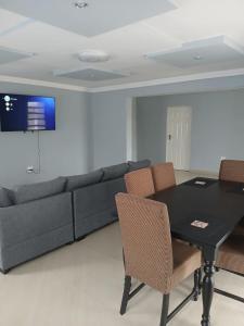 TV a/nebo společenská místnost v ubytování The Cozy Nest