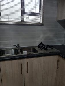 Imagem da galeria de The Cozy Nest em Maseru