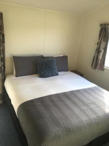 Katil atau katil-katil dalam bilik di Tongariro Holiday Park