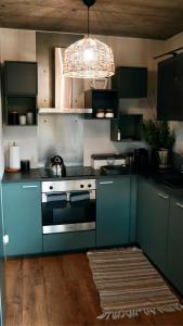 Kuchyň nebo kuchyňský kout v ubytování Beskidzki Reset