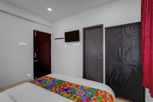 Ένα ή περισσότερα κρεβάτια σε δωμάτιο στο FabHotel Pavis Inn +26 φωτογραφίες