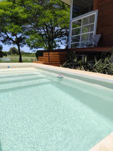 Swimmingpoolen hos eller tæt på Cabaña Sol de Otoño