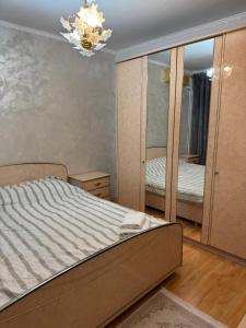 Ένα ή περισσότερα κρεβάτια σε δωμάτιο στο Ploiesti ultracentral !!! +5 φωτογραφίες