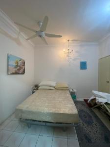 En eller flere senge i et værelse på Laman Qurattu A'yun