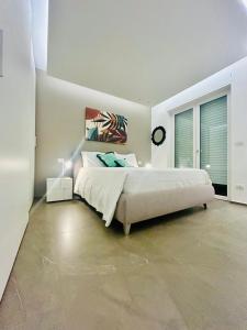 En eller flere senge i et værelse på LifeStyle Boutique Apartment