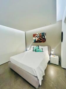 En eller flere senge i et værelse på LifeStyle Boutique Apartment