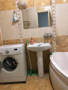 Koupelna v ubytování Shevchenka Guest House от 600гр 1-2-3к квартири 096-55-48-111 біля Академії + 19 fotografií